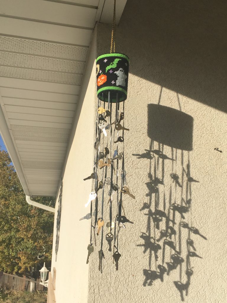 cross stitched Halloween wind chime